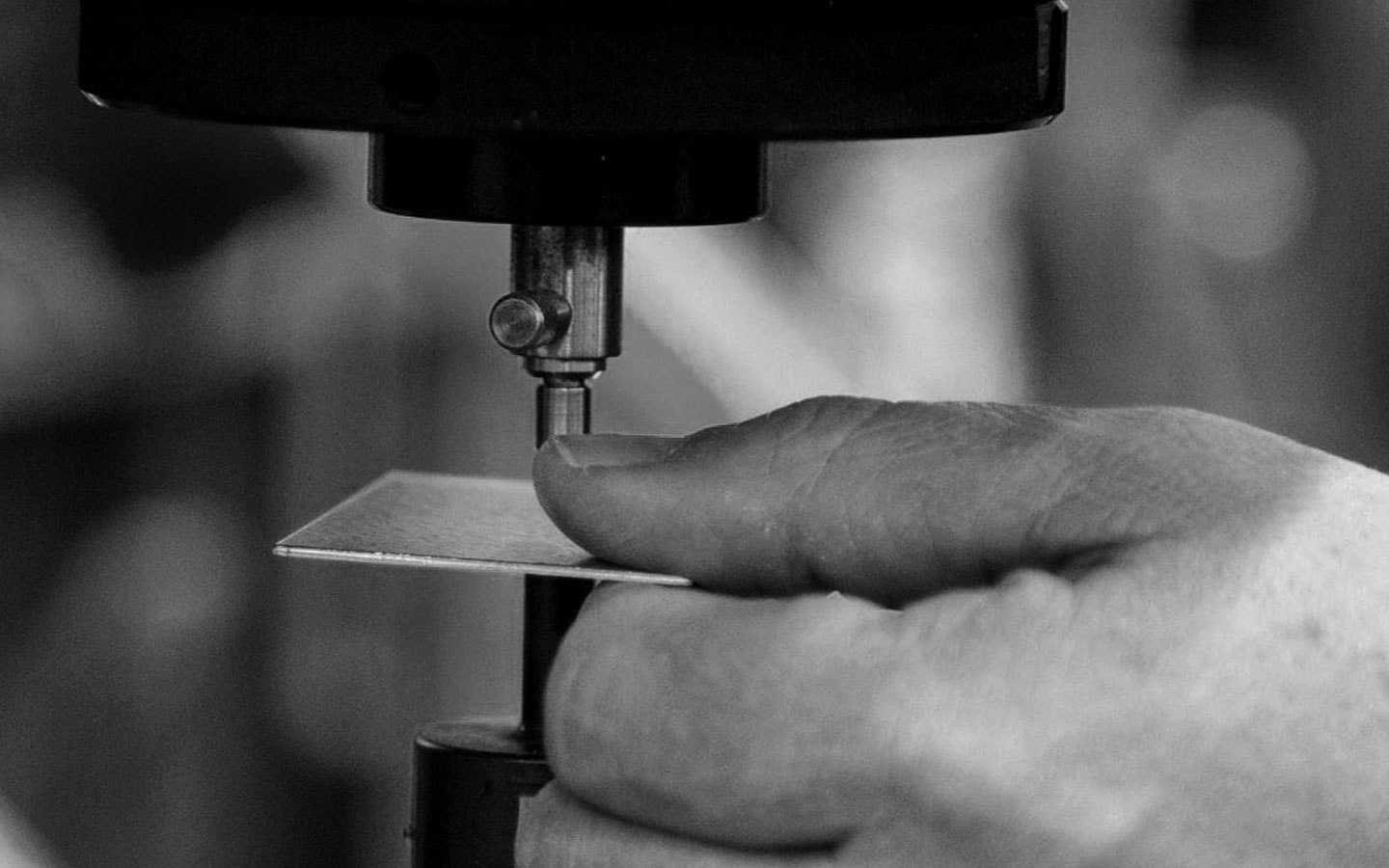 A Majestic Steel Associate testing the steel's gauge, ensuring quality for our customers